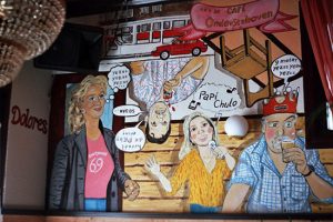 'Feest-cartoon' muurschildering; Cafe 'ondersteboven' Acryl.